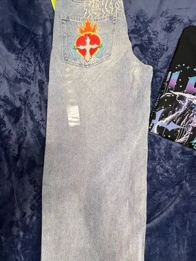 Zumiez Light Blue Denim Jeans with Red & Orange Heart Patch